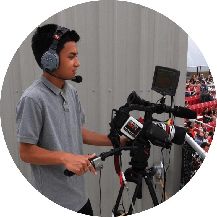 Max Arnold working a camera at the Ballpark at Rosemont, home of the Chicago Bandits.